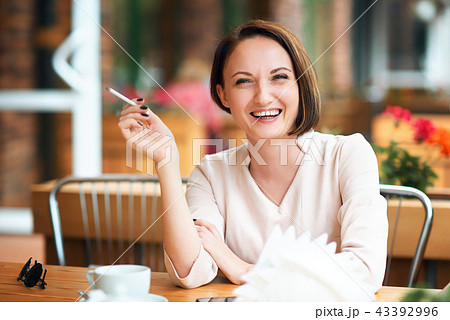 Young woman posing in city outdoor Young woman posing in city outdoor 43392996