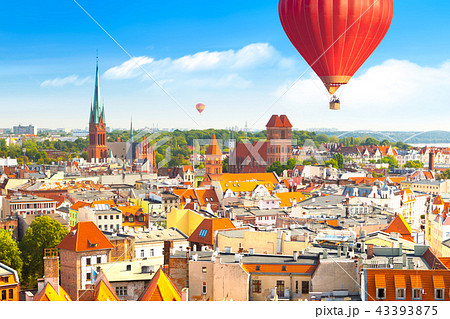 Panoramic view of historical buildings and roofs in Polish medieval town Torun 43393875