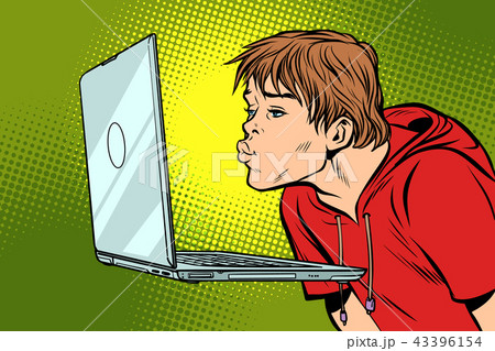 A man kisses the computer screen 43396154