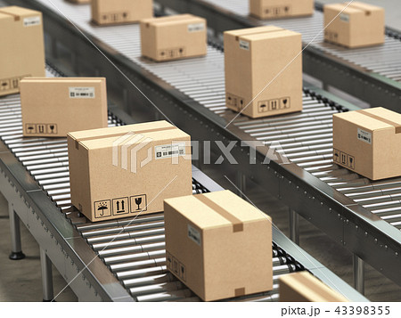 Cardboard boxes on conveyor  in  warehouse 43398355