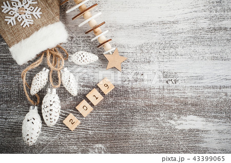 Santa glove and christmas pine cones Santa glove and christmas pine cones 43399065