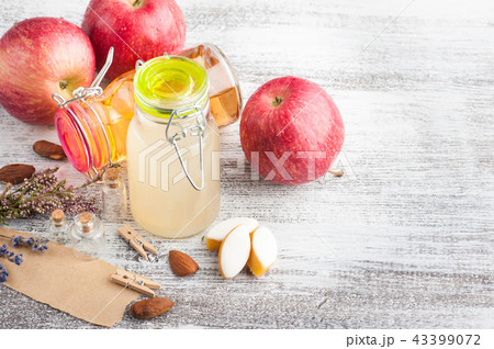 Homemade apple cider and fresh apples 43399072