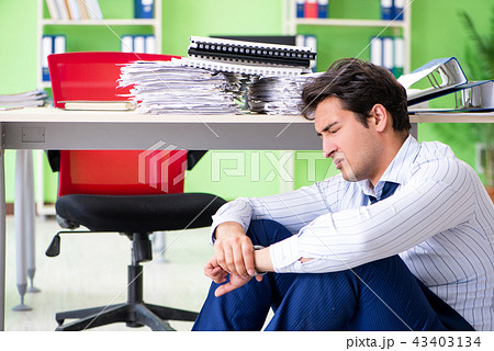 Frustrated businessman stressed from excessive work 43403134
