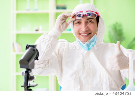 Chemist working in the lab on new experiment Chemist working in the lab on new experiment 43404752