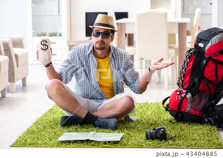 Man planning his travel with map Man planning his travel with map 43404885