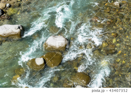 天人峡渓谷の忠別川の流れ 天人峡渓谷の忠別川の流れ 43407352
