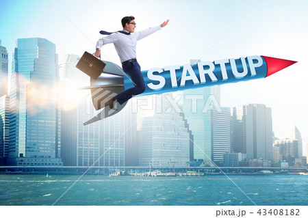 Businessman in start-up concept flying on rocket 43408182