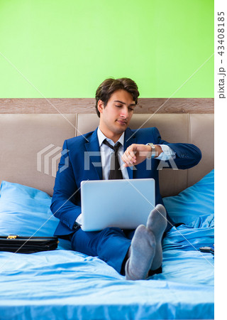 Businessman working in the hotel room 43408185