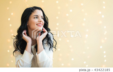 Happy young woman Happy young woman 43422185