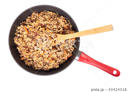 cooked rice with vegetables in a frying pan 43424316
