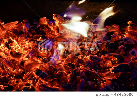Burning firewood in the fireplace close up, BBQ fire, charcoal background. Burning firewood in the fireplace close up, BBQ fire, charcoal background. 43425080