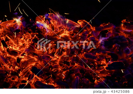 Burning firewood in the fireplace close up, BBQ fire, charcoal background. Burning firewood in the fireplace close up, BBQ fire, charcoal background. 43425086