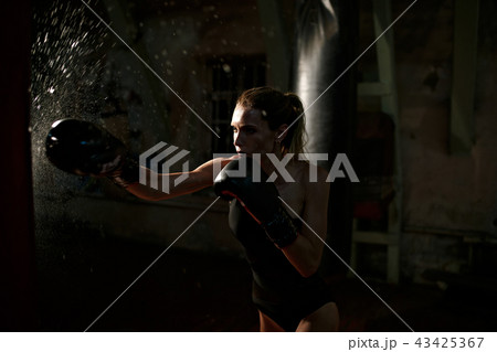 Boxing woman in black body Boxing woman in black body 43425367