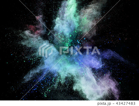 Colored powder explosion on black background. Colored powder explosion on black background. 43427483