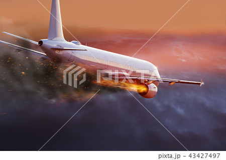 Airplane with engine on fire, concept of aerial disaster. Airplane with engine on fire, concept of aerial disaster. 43427497