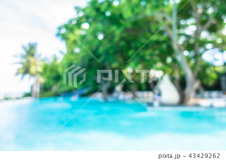 Abstract blur and defocused beautiful outdoor swimming pool in hotel and resort 43429262