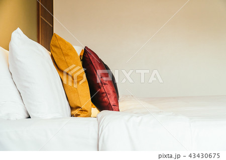 Comfortable pillow on bed Comfortable pillow on bed 43430675