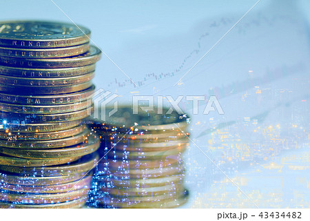 Double exposure of money coins with cityscape 43434482