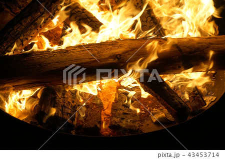 Bonfire burning in the dark, flame close up Bonfire burning in the dark, flame close up 43453714