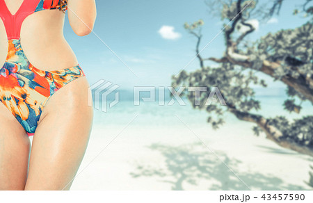 Happy young woman at beach in summer vacation. 43457590