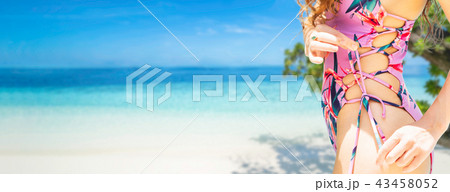 Happy young woman at beach in summer vacation. 43458052