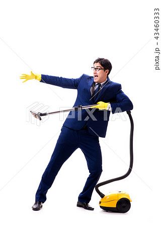 Handsome businessman with vacuum cleaner isolated on white backg Handsome businessman with vacuum cleaner isolated on white backg 43460333