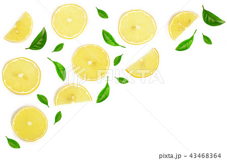 Slices lemon decorated with green leaves isolated on white background with copy space for your text Slices lemon decorated with green leaves isolated on white background with copy space for your text 43468364