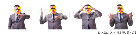 Businessman with many reminders isolated on white 43468721