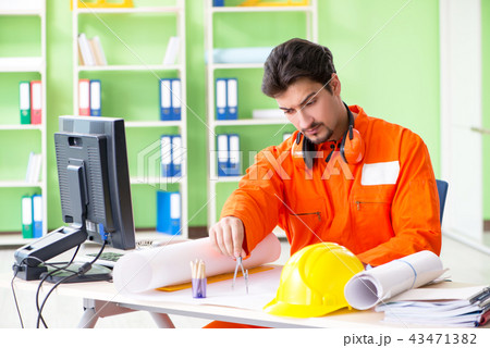 Construction supervisor planning new project in office 43471382