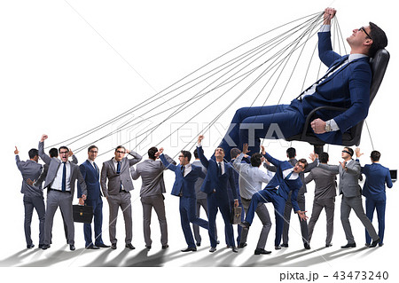 Boss employee manipulating his staff in business concept Boss employee manipulating his staff in business concept 43473240