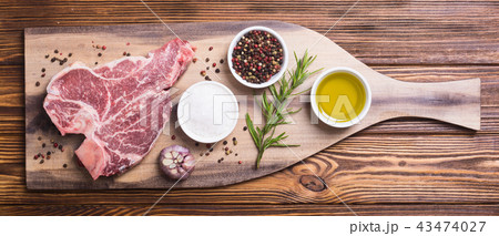 Raw beef steak T bone with ingredient Raw beef steak T bone with ingredient 43474027