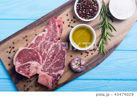 Raw beef steak T bone with ingredient Raw beef steak T bone with ingredient 43474029