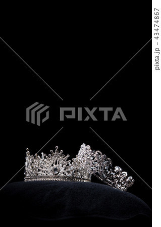 Diamond Silver Crown for Miss Pageant Beauty queen Contest, Crystal Tiara jewelry decorated gems stone and black velvet fabric cloth, photography copy space for text logo 43474867