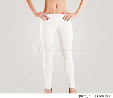 Woman wear blank white leggings mockup, isolated on grey. Woman wear blank white leggings mockup, isolated on grey. 43480104