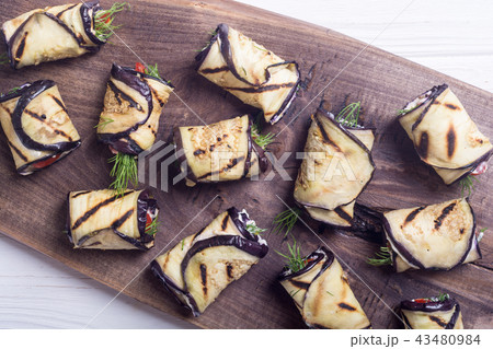 Grilled eggplant aubergine rolls with cream cheese Grilled eggplant aubergine rolls with cream cheese 43480984