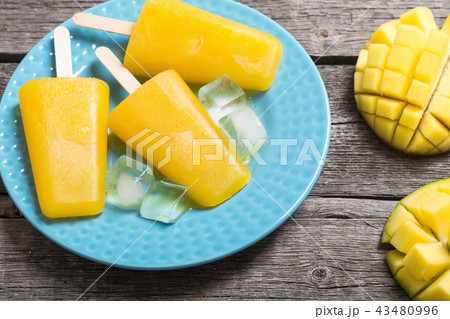 Homemade mango popsicle 43480996