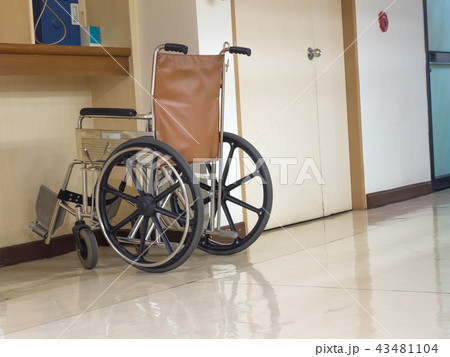 wheelchair parking in the front of blue telephone wheelchair parking in the front of blue telephone 43481104