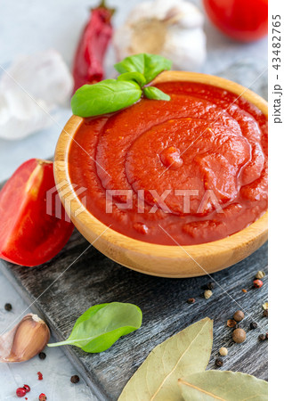 Bowl with homemade tomato sauce. Bowl with homemade tomato sauce. 43482765