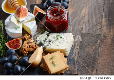 Cheese plate with fruits and nuts. Cheese plate with fruits and nuts. 43483505