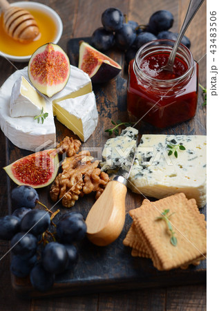 Cheese plate with fruits and nuts. Cheese plate with fruits and nuts. 43483506