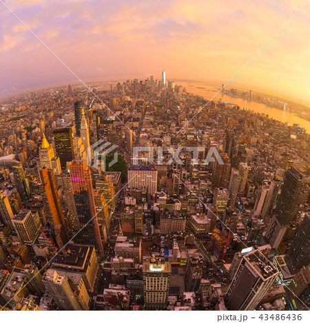 New York City skyline with Manhattan skyscrapers at dramatic stormy sunset, USA. 43486436