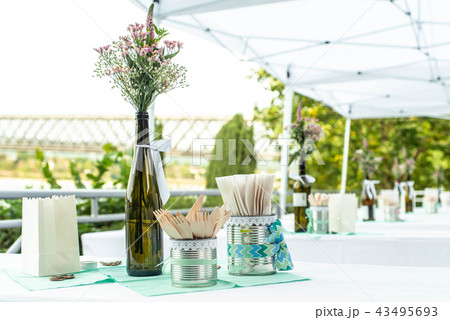 flowers settings decoration outdoor setup for wedding with pink colored flower 43495693