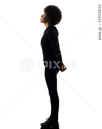 young teenager girl woman standing looking up shadow silhouette young teenager girl woman standing looking up shadow silhouette 43505634