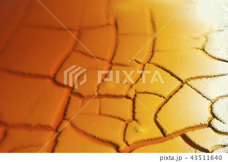 background, texture - rusty water on cracked clay background, texture - rusty water on cracked clay 43511640