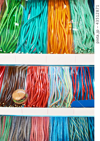 Long colorful marmalade on shelf of pastry shop 43512871