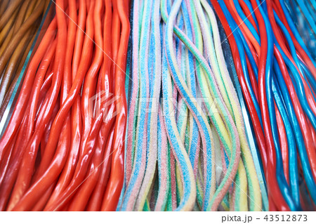 Long colorful marmalade on shelf of pastry shop 43512873