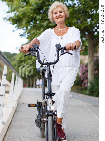 Elderly woman going to biking 43527298