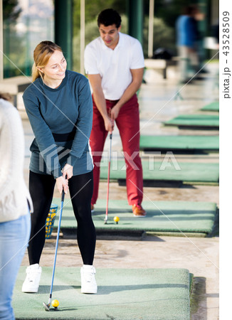 Golf partners playing together 43528509