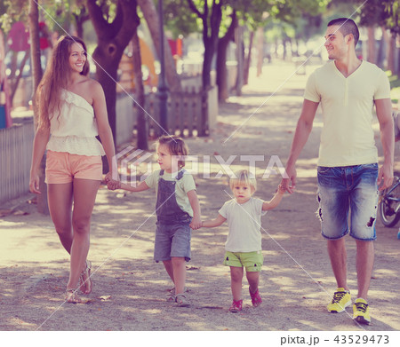 Parents with children holding vacation day 43529473