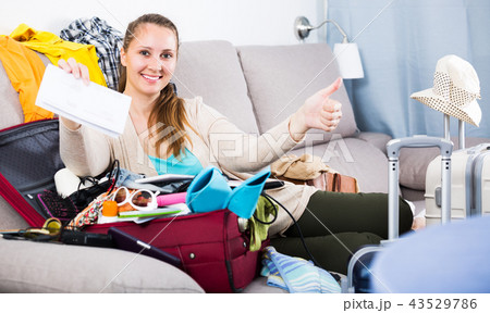 Woman getting ready for holidays Woman getting ready for holidays 43529786